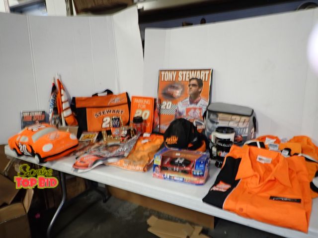 Lot 59-50023 - Large Tony Stewart #20 Nascar Collection of Shirts, T-shirts, Hats, Pictures, Coolers, Cups
