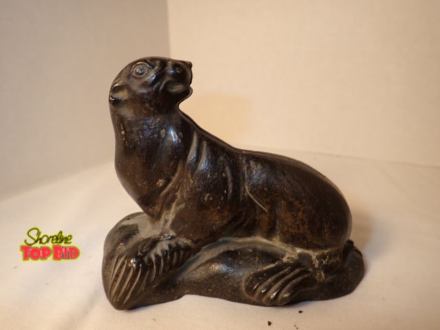 Lot 59-21262 - Antique Arcade Cast Iron "Seal on Rock" Bank, Est. Value $300 and $700, 3 1/2" tall x 4 1/2" long