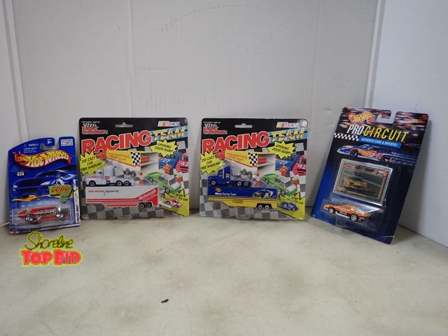 Lot 59-41741 - 2EA. racing team Nascar trucks and 2EA. hot wheels