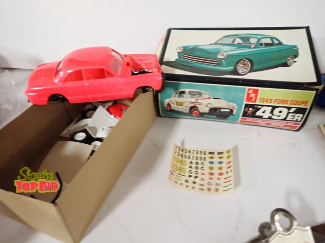 Lot 59-43126 - AMT 1949 Ford Coupe Model Kit with Original Box - It Appears as Partially put together, Some Box Dam...