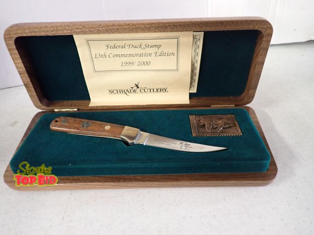 Lot 59-60028 - Collectible Schrade Cutlery 13th Commemorative Edition Knife Set with Wood Display Case and a Specia...