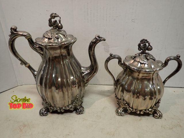 Lot 59-14548 - Reed &amp; Barton 1765 Set of Fluted "Melon" Shape with Ornate Floral Finials, Silverplated Teapot &...
