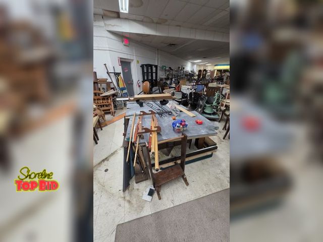 Lot 59-95014 - OFFSITE  Disassembled Brunswick slate pool table. Base cracked, sold for parts or repair. 30.5 in ta...