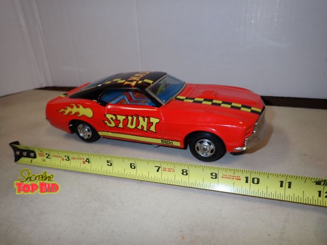 Lot 59-41133 - Tin Litho Ford Mustang Mach-1 Stunt Race Car Japan Battery Powered 10 1/2" long, Mint