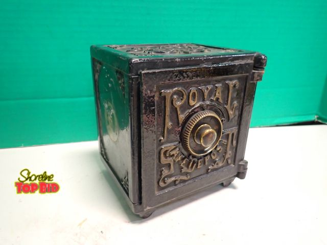 Lot 59-14125 - 1880s Cast Iron "Royal" Safe Deposit Bank includes Lithographed Child Portrait 6" x 5 1/2" x 5 1/2"