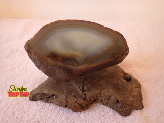 Lot 59-43422 - Polished Agate on a Wooden Stand