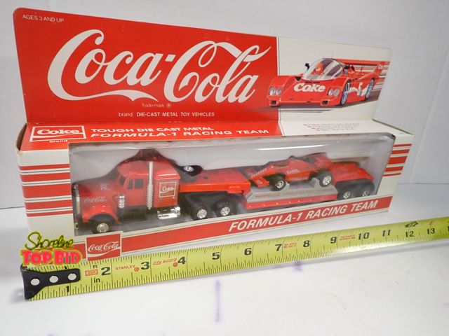 Lot 59-96007 - Vintage Diecast Coca-Cola Formula-1 Racing Team Tractor, Trailer &amp; Car, Original Box