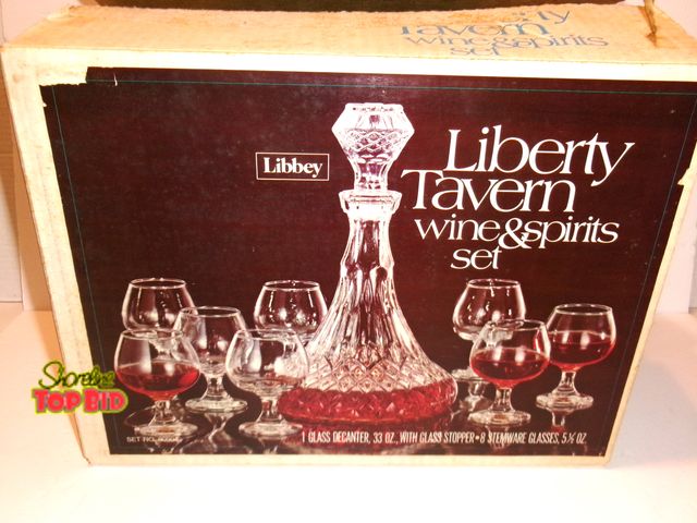 Lot 59-74589 - Vintage Libbey Liberty Tavern Wine &amp; Spirits Set from the 1960s, featuring a 33 oz. faceted glas...