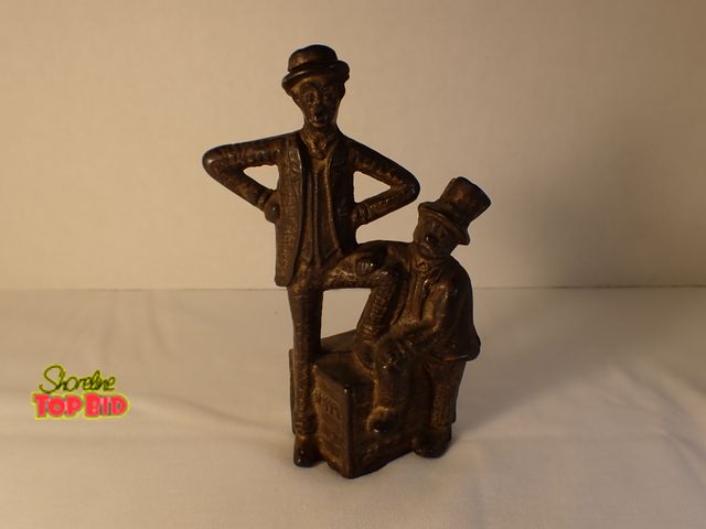 Lot 59-20211 - Antique Cast Iron Mutt and Jeff Still Bank by A.C. Williams Co. between 1912 and 1931, Original 5" t...