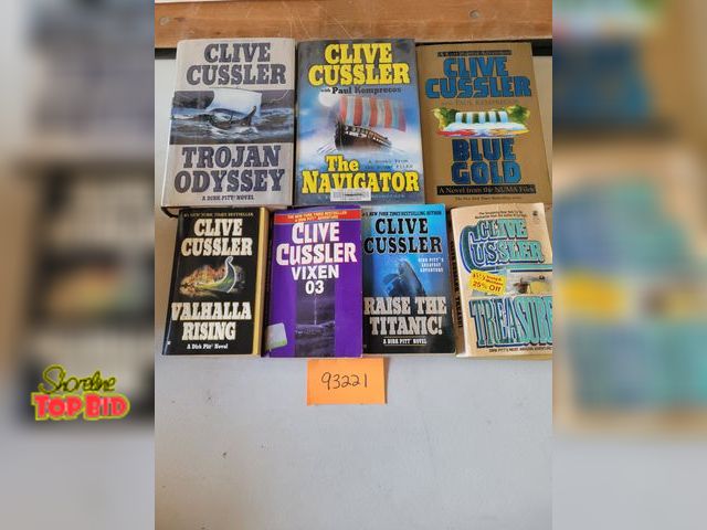 Lot 59-93221 - Clive Cussler Seven Book Lot! Includes both hardback and paperback editions. See photos for specific...