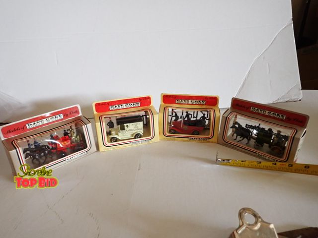 Lot 59-43133 - 4 Die-Cast Days Gone Collection Vehicles, Unopened Original Packaging