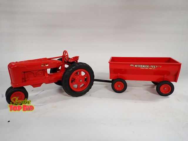 Lot 59-14163 - 1950s Plastic International Harvester Farmall Tractor &amp; Trailer