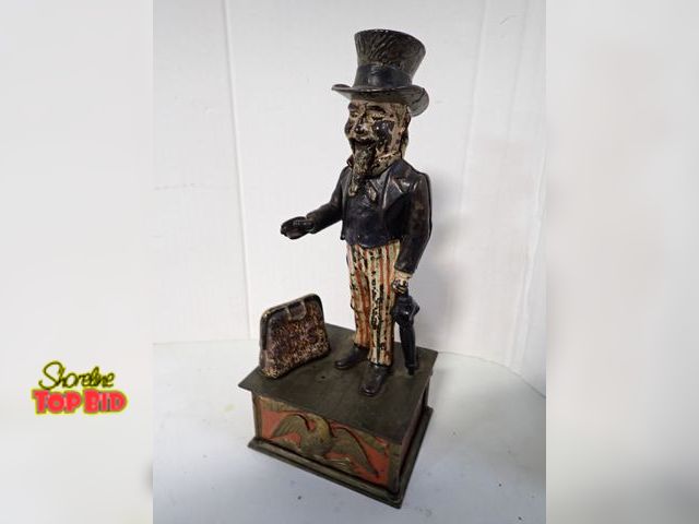 Lot 59-10348 - Original Antique Uncle Sam Cast Iron Mechanical Bank, Working