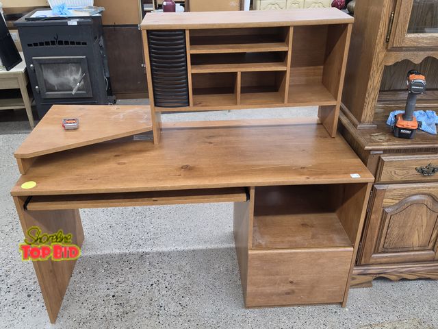 Lot 59-95008 - OFFSITE -  Wood computer desk with CD rack, has scratch marks, 54 in wide 48 in tall 24 in depth