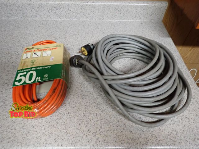 Lot 59-43181 - 2 Extension Cords - One 50' Medium Duty and One Heavy Duty