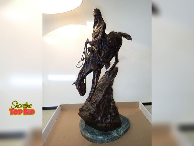 Lot 59-13030 - 25 1/2" Bronze Sculpture by Fredric Remington Called "The Mountain Man", a top a marble base