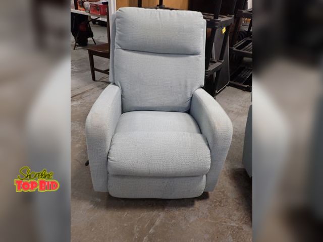 Lot 59-21032 - La-Z-Boy Finley Rocking Recliner, Light Blue Patterned Fabric with Sleek Track-Arm Design, Pet &amp;...