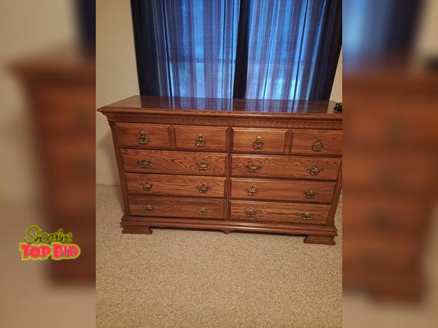 Lot 59-76041 - OFFSITE-High End dresser..8 drawers..33 1/2" tall x 56" long x 19" deep..think it's mahogany .. very...