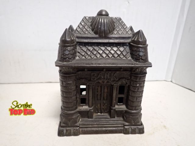 Lot 59-14213 - Ca. 1890, Cast Iron Four Tower Still Bank by J &amp; E Stevens Co. 6" tall x 4.25" wide x 3.25" deep...