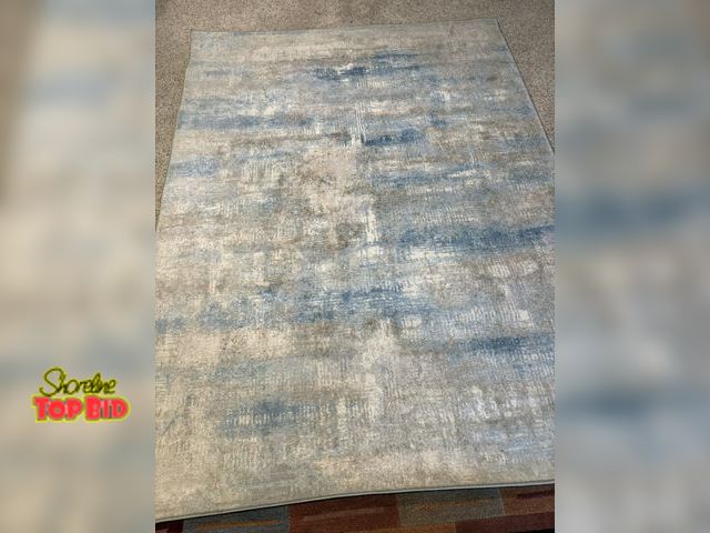 Lot 59-40013 - Blue grey and tan Calvin Klein area rug - 5'3"x 7'