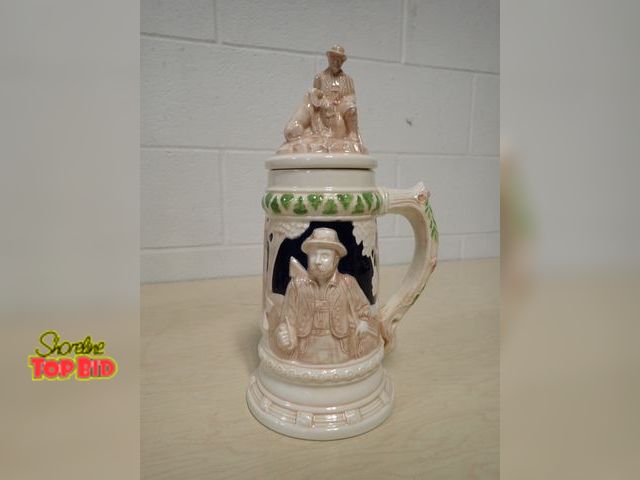 Lot 59-33023 - Vintage Ceramic Beer Stein, 3D Relief Design of a Woodsman Hunter, His Dog and a Deer, Corner Cerami...