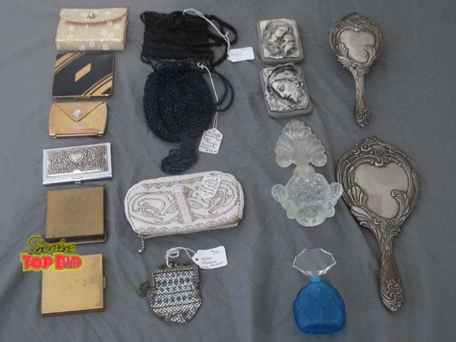 Lot 59-10029 - Large lot of vintage ladies collectible items:  6 makeup compacts; 4 purses; 2 perfume bottles; meta...