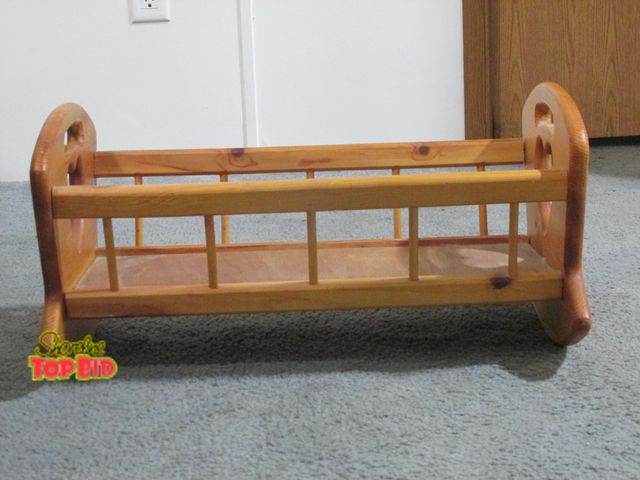 Lot 59-10099 - Wooden rocking cradle for dolls.  Looks good, rocks good, is solid, not scratched up, made of pine a...