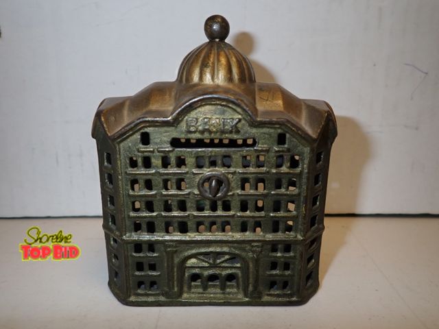 Lot 59-14116 - Antique A.C. Williams Cast Iron "Domed Bank" Still Penny Coin Bank, early 20th Century 5" tall x 4" ...