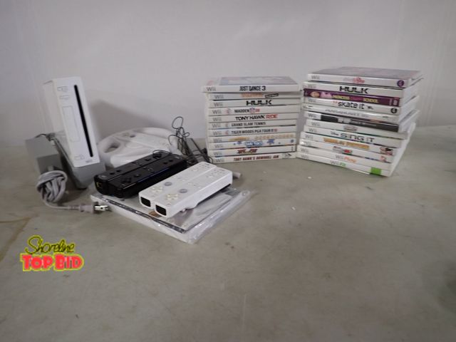 Lot 59-33535 - Nintendo Wii Game with 2 Sets of Controllers, 23 Games