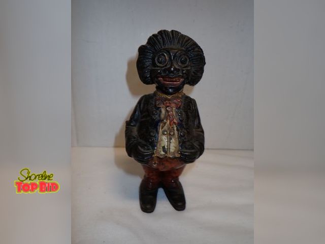 Lot 59-10347 - Antique Cast Iron "Golliwog" Still Bank by John Harper
