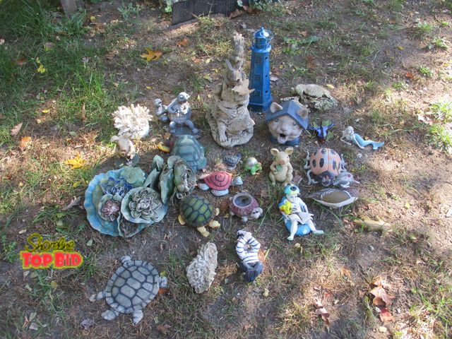 Lot 59-92054 - pond turtles and misc. pigs, sunbather sprinkler, sailor, light house, woodpecker needs tlc.