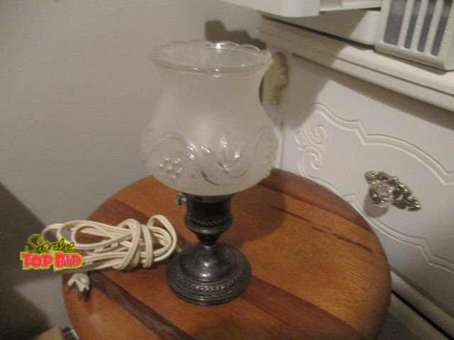 Lot 59-92015 - sterling silver desk lamp/ 9 inch high  bottom of globe chipped