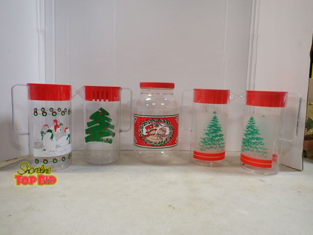 Lot 59-41689 - 4 Christmas beverage pitcher with Christmas storage jar