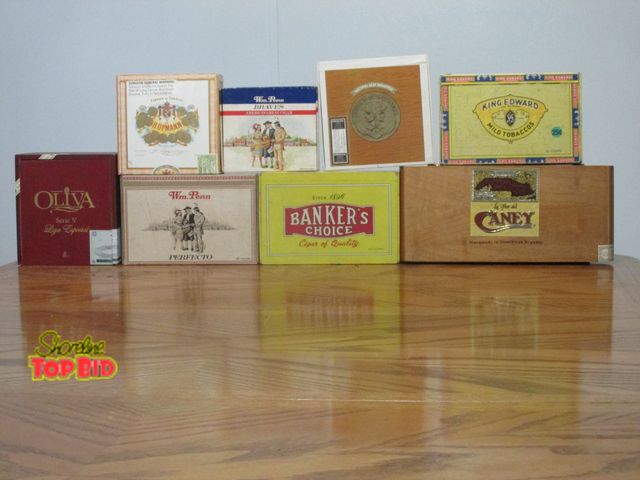Lot 59-10089 - Lot of 8 different collectible empty cigar boxes.  2 are made of wood, the other 6 are standard card...