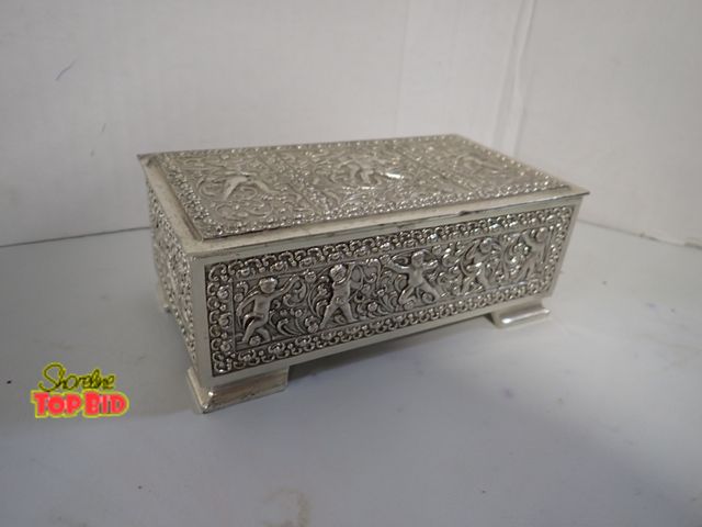 Lot 59-10376 - Vintage Jewelry or Trinket Music Box, featuring Embossed Designs of Cherubs and Floral Scrolls 2 1/4...