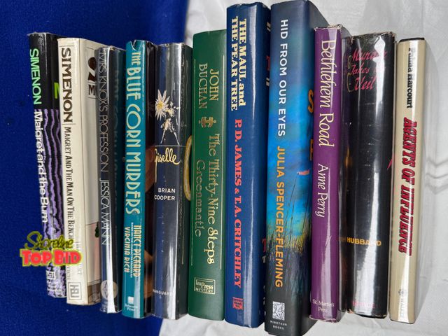 Lot 59-43524 - Eleven hardcover mysteries.  Many iconic authors. Excellent condition.