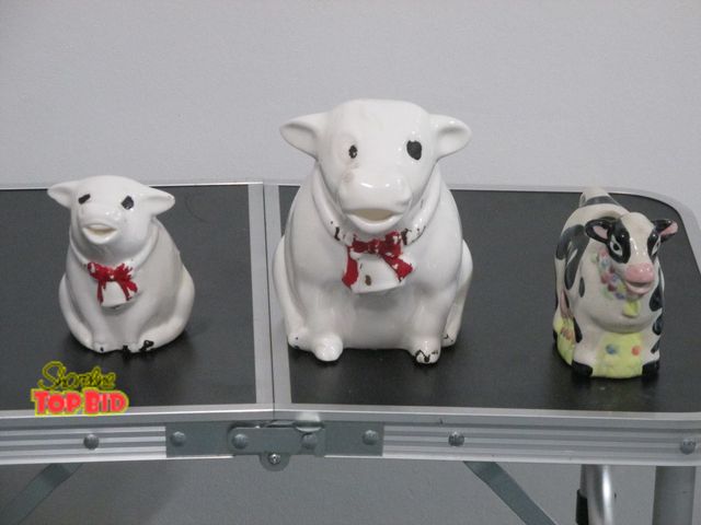 Lot 59-10034 - 3 ceramic cow figurines, 2 are a cow and her calf