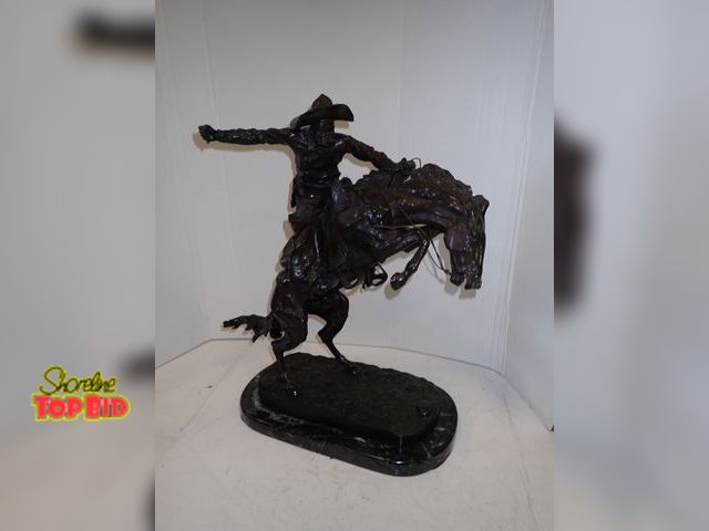Lot 59-10002 - Signed Frederic Remington, Bronze Sculpture titled "The Bronco Buster", 22" ht. x 18" length x 9.5' ...