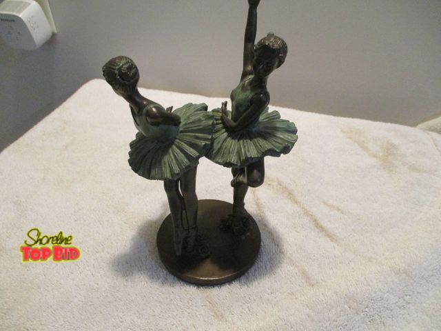 Lot 59-80064 - ballerina's figurine i believe they are some kind of metal magnet does stick to the legs but not the...