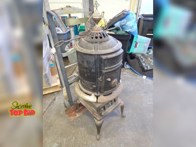 Lot 59-24054 - Wisdon Oak Wood Burning Barrel Stove with Some Nickel Plated Accents 50" tall