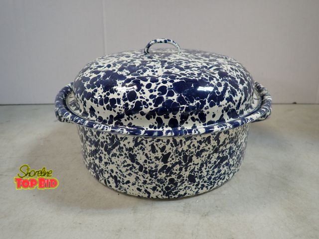 Lot 59-41784 - Never used blue and white metal speckled pot with handles and lid. Pot is 10" wide 3.5" deep 8 1/4" ...