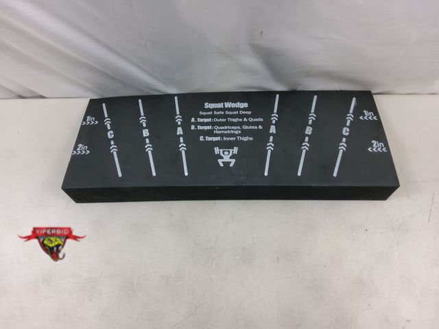 Lot 7-131551 - Squat wedge block. 27" X 10".