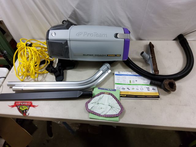 Lot 7-133436 - Retail value $529. Lightly used. ProTeam Super Coach Pro 10 Backpack Vacuum Commercial with Telescop...