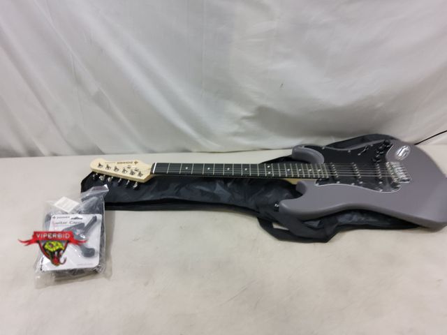 Lot 7-131854 - No amplifier. Donner electric guitar with accessories.  Model DST-80. Note: 1 string needs adjusting...