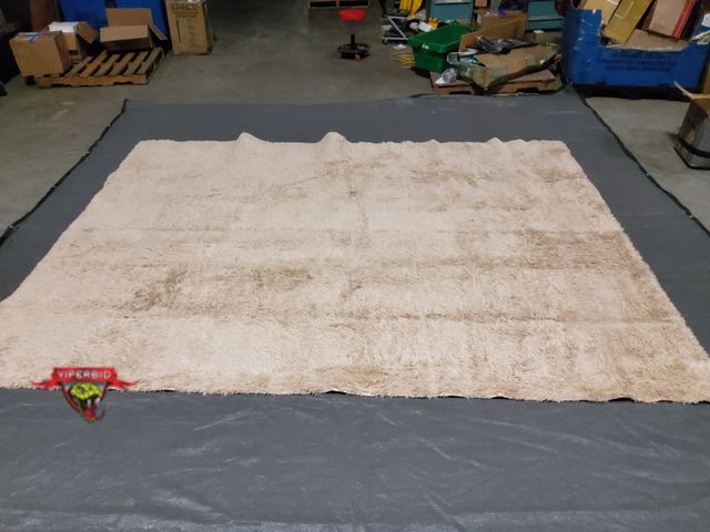 Lot 7-130314 - 9 ft. X 12 ft. Faux Fur Area rug.