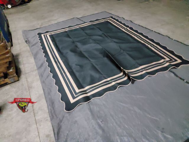 Lot 7-135784 - 8 ft. X 10 ft. Scalloped edge jute type area rug.