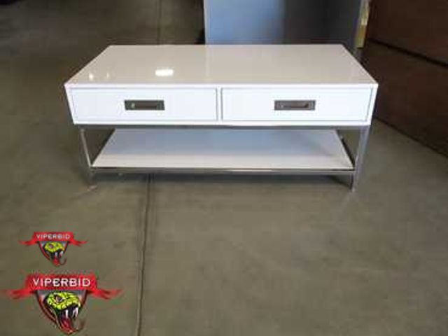 Lot 7-131409 - New! Project 62 Ronchamp 2 drawer white/chrome coffee table. 44"W X 18"H. Will need to be assembled.