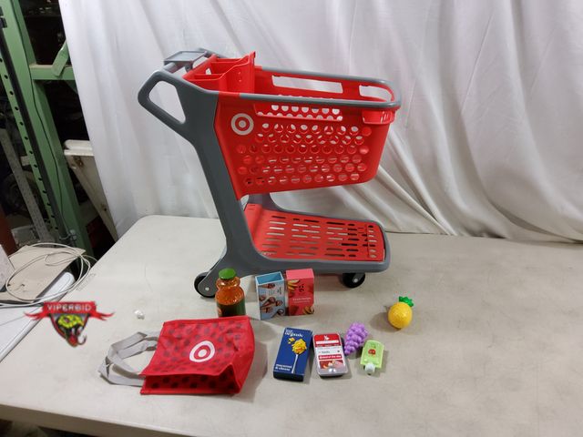 Lot 7-132722 - Plastic shopping cart with accessories. 22"H.