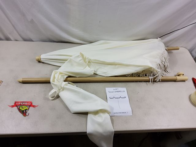 Lot 7-130904 - 6.5 Ft. Patio umbrella with fringe. Tilts.