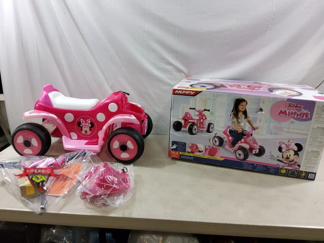 Lot 7-132911 - Looks New! Huffy Disney Junior Minnie Mouse 6V Battery powered ride-on. 1.5-3 years.